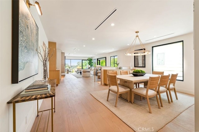 13817 Valley Vista Blvd, Sherman Oaks, CA 91423 - dining room with recessed lighting and light wood-type flooring