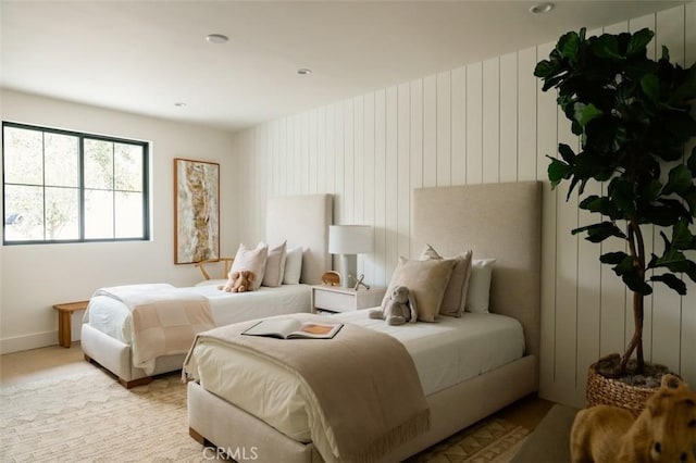 bedroom featuring baseboards