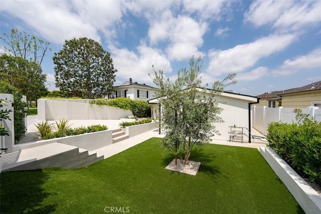 view of yard featuring fence