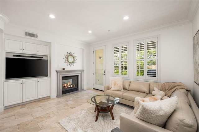 living area with a fireplace with flush hearth, ornamental molding, recessed lighting, and visible vents