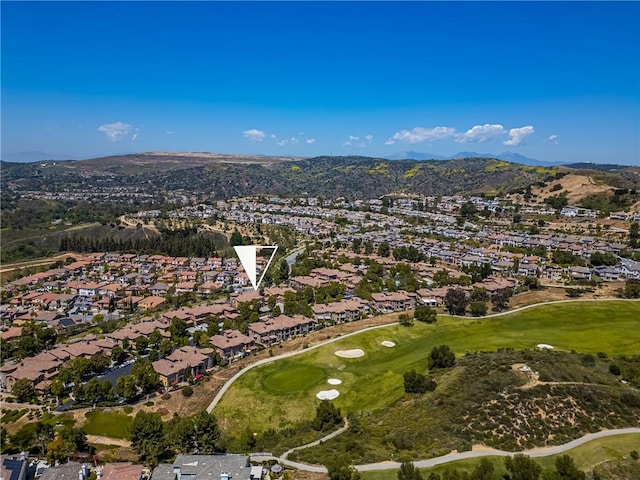 bird's eye view featuring view of golf course, a residential view, and a mountain view