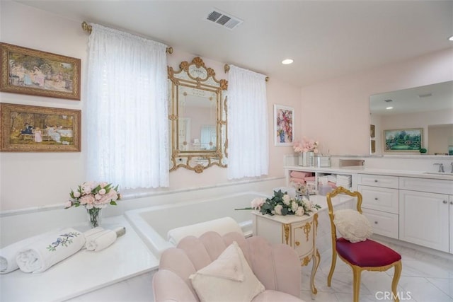30223 Mahogany St, Murrieta, CA 92563 - full bath featuring vanity, a wealth of natural light, a garden tub, and visible vents