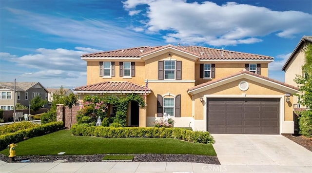 30223 Mahogany St, Murrieta, CA 92563 - mediterranean / spanish-style house with a tiled roof, driveway, a front yard, and stucco siding