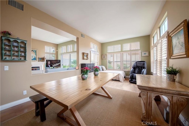 10925 Kimball Pl, Tustin, CA 92782 - dining room with visible vents, wood finished floors, and a healthy amount of sunlight