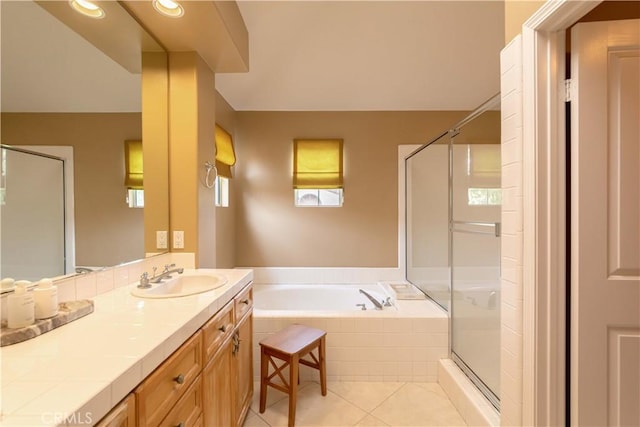 10925 Kimball Pl, Tustin, CA 92782 - full bath with vanity, tile patterned floors, a garden tub, and a stall shower