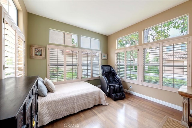 10925 Kimball Pl, Tustin, CA 92782 - bedroom with baseboards and wood finished floors