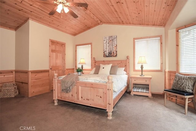 bedroom featuring wooden ceiling, a wainscoted wall, carpet floors, lofted ceiling, and wooden walls
