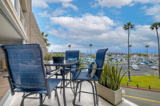 balcony with outdoor dining area