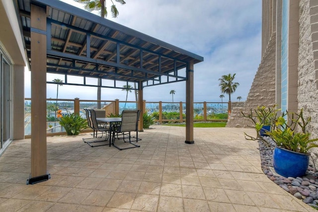 view of patio with a gazebo and outdoor dining space