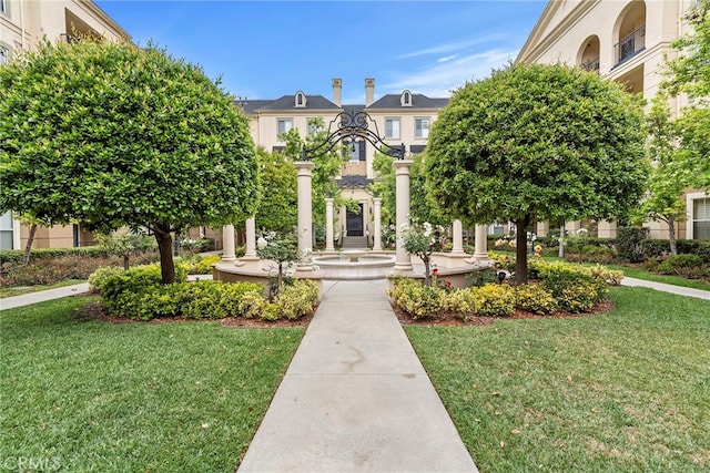 surrounding community with a lawn
