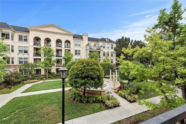 surrounding community with a yard