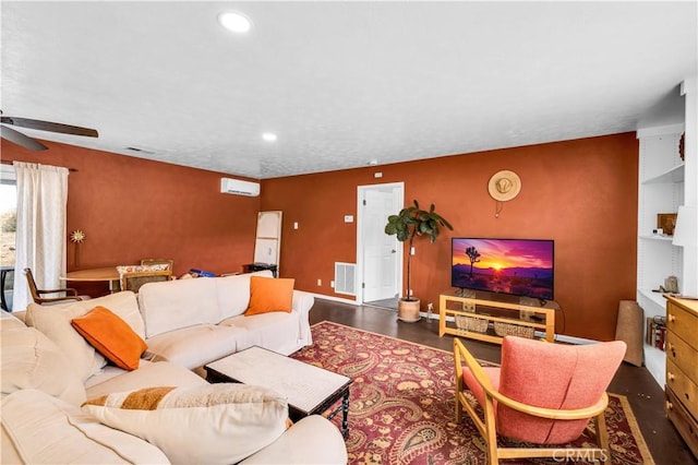 living room with visible vents, a ceiling fan, wood finished floors, and recessed lighting
