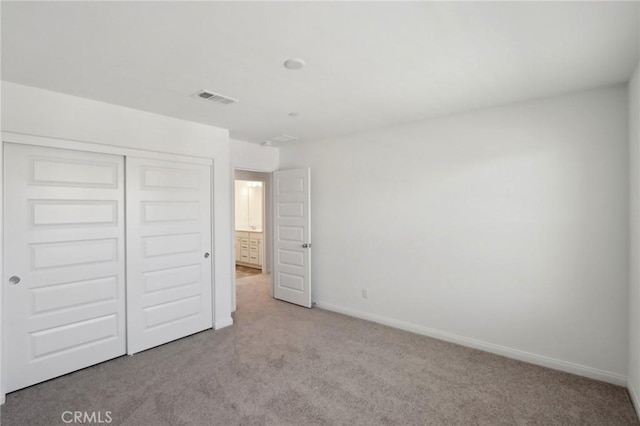 687 Ballesteros St, Perris, CA 92571 - unfurnished bedroom featuring baseboards, visible vents, carpet, and a closet