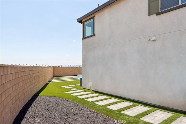 687 Ballesteros St, Perris, CA 92571 - view of yard with a fenced backyard