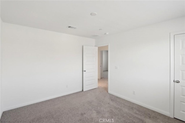 687 Ballesteros St, Perris, CA 92571 - unfurnished room featuring baseboards, light colored carpet, and visible vents