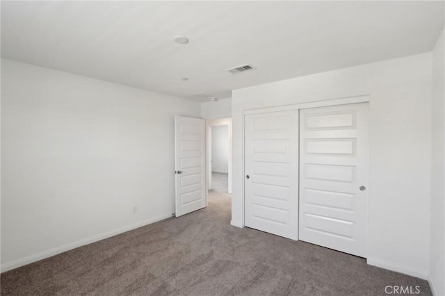 687 Ballesteros St, Perris, CA 92571 - unfurnished bedroom with visible vents, baseboards, carpet floors, and a closet