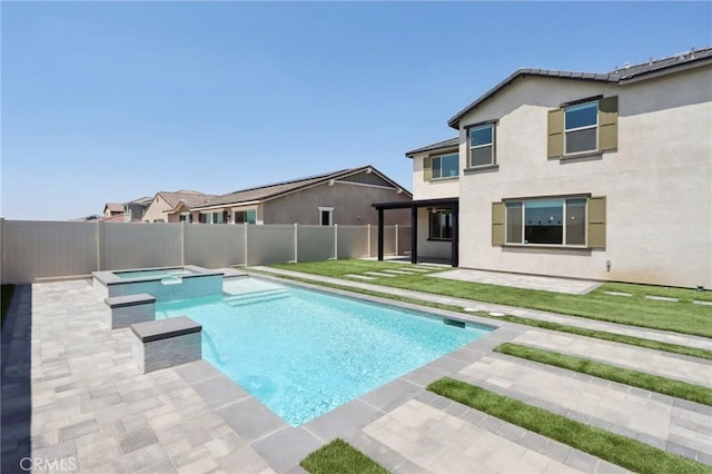 687 Ballesteros St, Perris, CA 92571 - view of swimming pool featuring a fenced backyard, a pool with connected hot tub, and a patio area