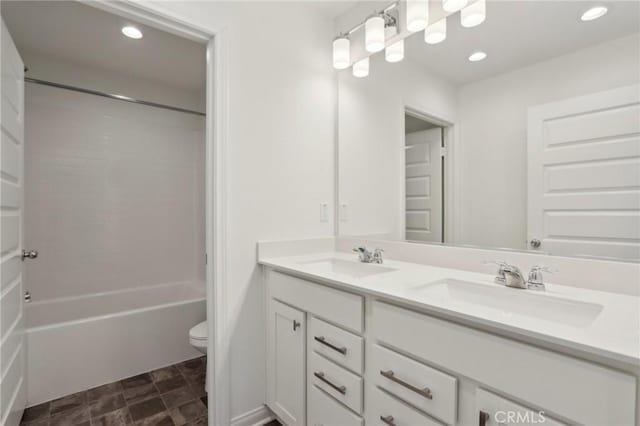 687 Ballesteros St, Perris, CA 92571 - full bath featuring a sink, bathtub / shower combination, toilet, and double vanity