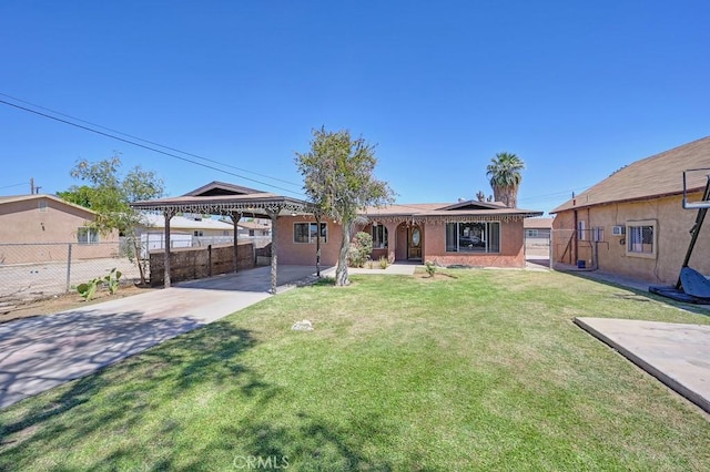 1107 B St, Brawley, CA 92227 - single story home featuring fence, stucco siding, a front yard, concrete driveway, and a carport