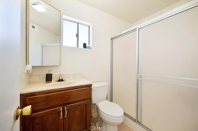 1107 B St, Brawley, CA 92227 - bathroom with vanity, a stall shower, visible vents, and toilet