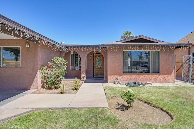1107 B St, Brawley, CA 92227 - view of front of property featuring a front lawn and stucco siding
