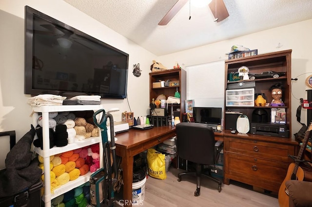1107 B St, Brawley, CA 92227 - home office featuring a ceiling fan, a textured ceiling, and wood finished floors