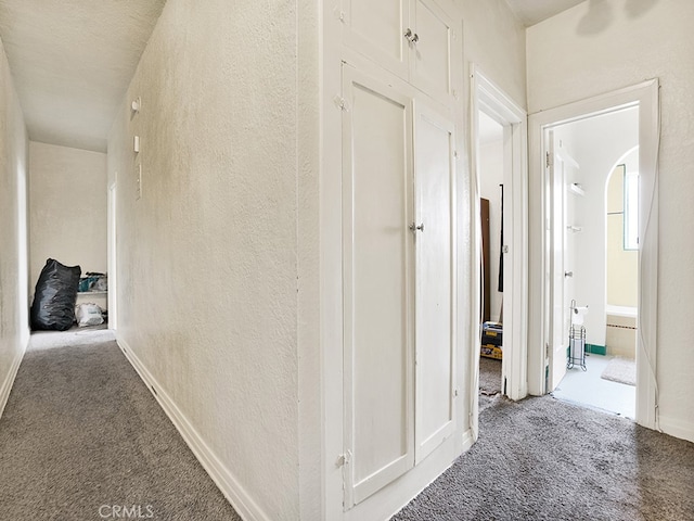 1407 Obispo Ave, Long Beach, CA 90804 - hall with carpet floors, a textured wall, and baseboards