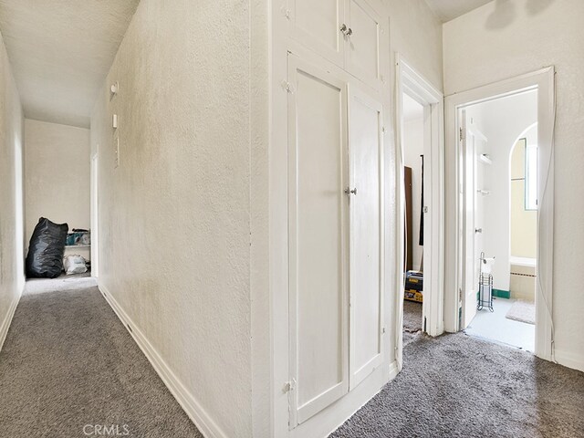 1407 Obispo Ave, Long Beach, CA 90804 - hall with carpet floors, a textured wall, and baseboards