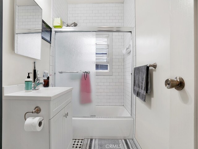 1407 Obispo Ave, Long Beach, CA 90804 - bathroom with vanity, bath / shower combo with glass door, and tile patterned flooring