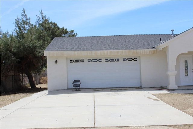 garage with driveway