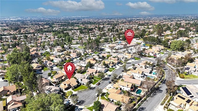 aerial overview of property's location with nearby suburban area