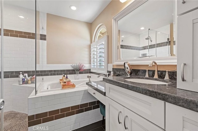 11691 Mount Baker Ct, Rancho Cucamonga, CA 91737 - full bath featuring a garden tub, a stall shower, and vanity