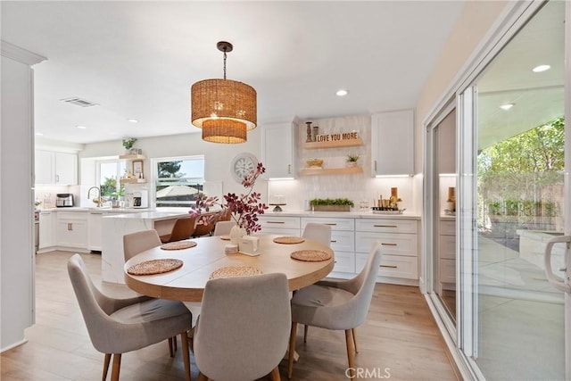 11691 Mount Baker Ct, Rancho Cucamonga, CA 91737 - dining room with recessed lighting and light wood-style floors