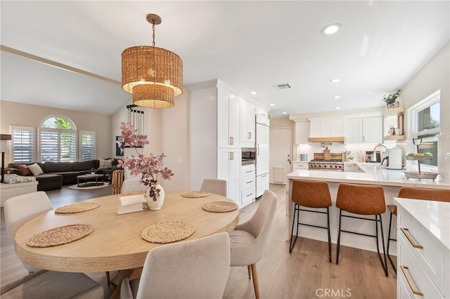 11691 Mount Baker Ct, Rancho Cucamonga, CA 91737 - dining room with a chandelier, light wood-type flooring, and recessed lighting
