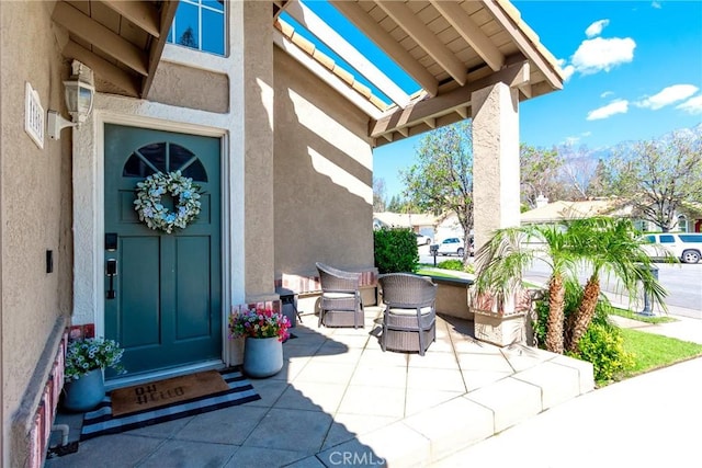 11691 Mount Baker Ct, Rancho Cucamonga, CA 91737 - entrance to property featuring stucco siding and a porch