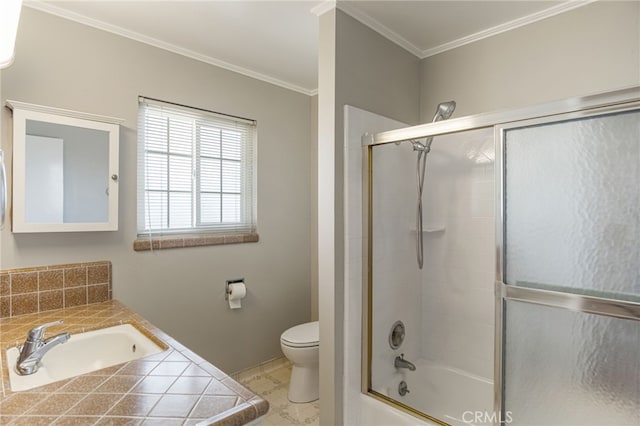 bathroom with crown molding, bath / shower combo with glass door, vanity, and toilet