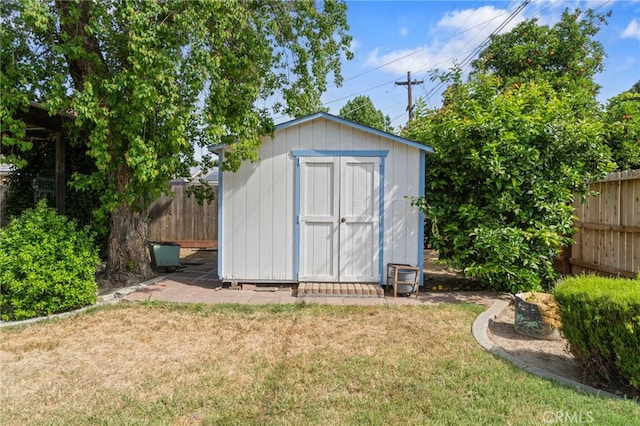 117 Spring Way, Madera, CA 93637 - view of shed featuring a fenced backyard