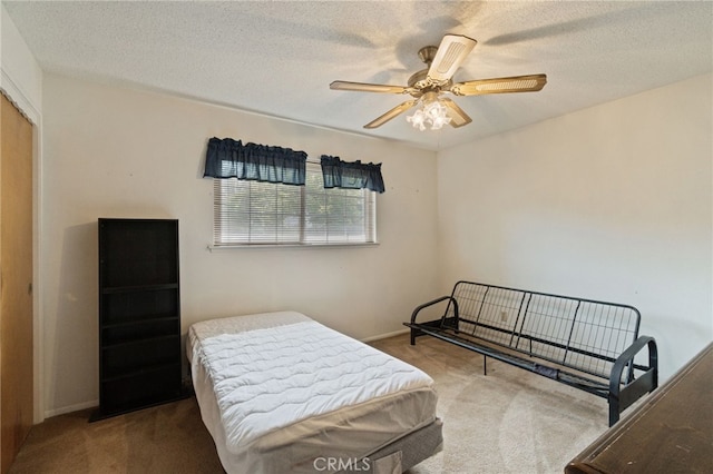 117 Spring Way, Madera, CA 93637 - bedroom with baseboards, a textured ceiling, carpet, and ceiling fan