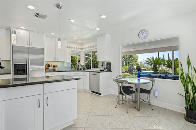 12320 Louise Ave, Granada Hills, CA 91344 - kitchen featuring appliances with stainless steel finishes, tasteful backsplash, recessed lighting, and white cabinets