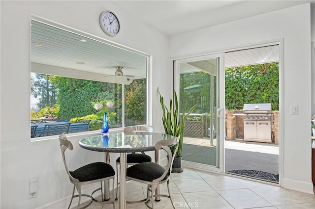 12320 Louise Ave, Granada Hills, CA 91344 - tiled dining area featuring ceiling fan and baseboards