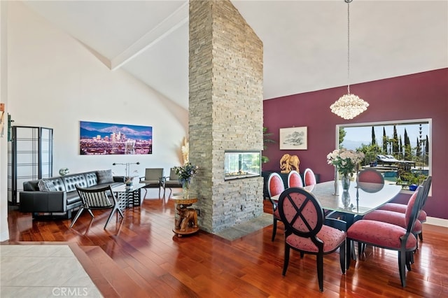 12320 Louise Ave, Granada Hills, CA 91344 - dining area with high vaulted ceiling, a chandelier, and hardwood / wood-style floors