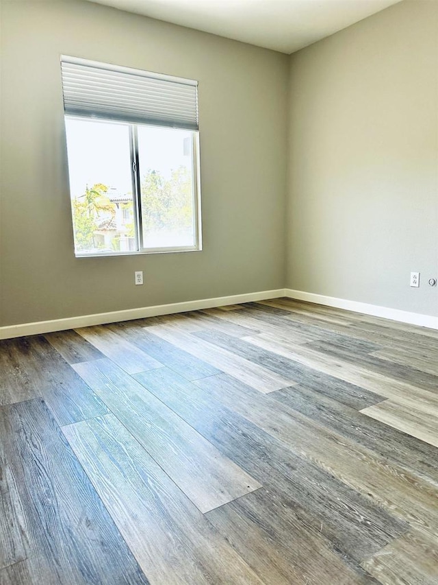 4729 Lagunita Way, Oceanside, CA 92057 - spare room featuring wood finished floors and baseboards