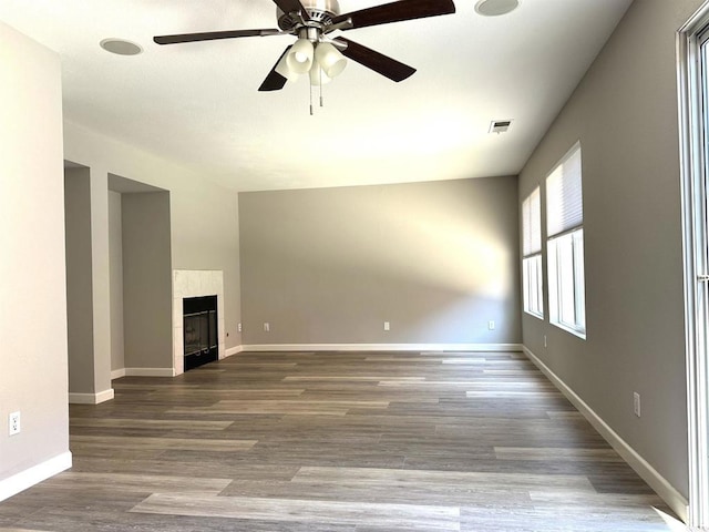 4729 Lagunita Way, Oceanside, CA 92057 - unfurnished living room featuring a ceiling fan, baseboards, and wood finished floors