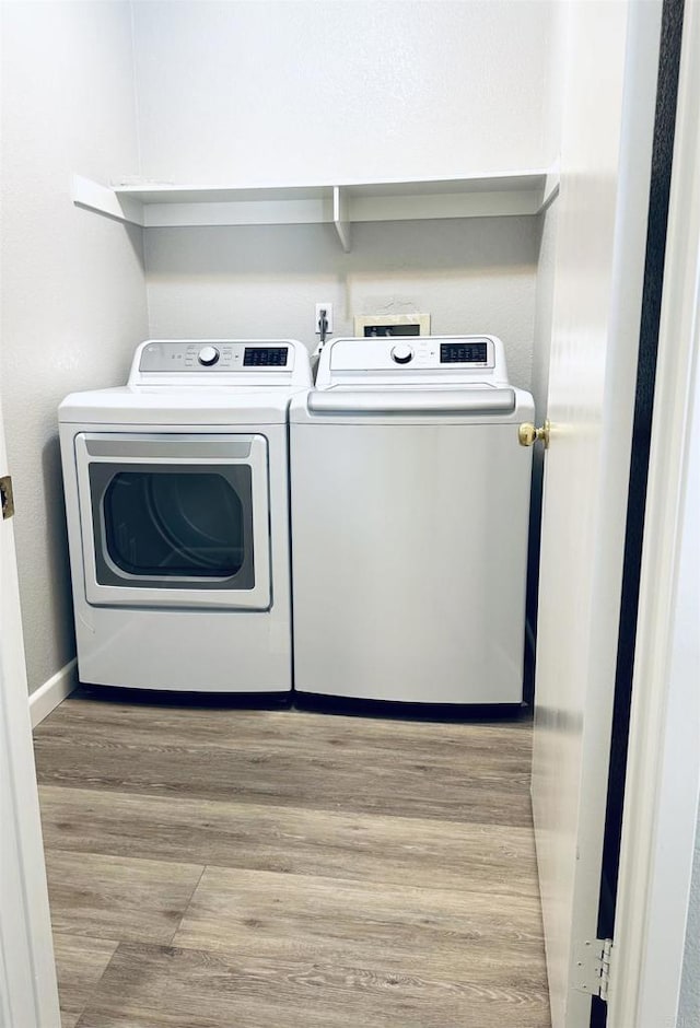 4729 Lagunita Way, Oceanside, CA 92057 - washroom with independent washer and dryer and wood finished floors