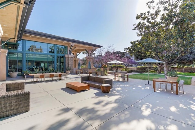 view of patio featuring outdoor dining area