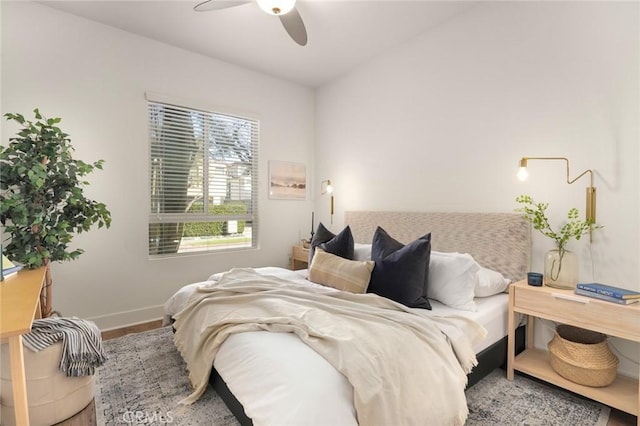 12920 W Runway Rd Unit 121, Playa Vista, CA 90094 - bedroom with a ceiling fan, baseboards, and wood finished floors