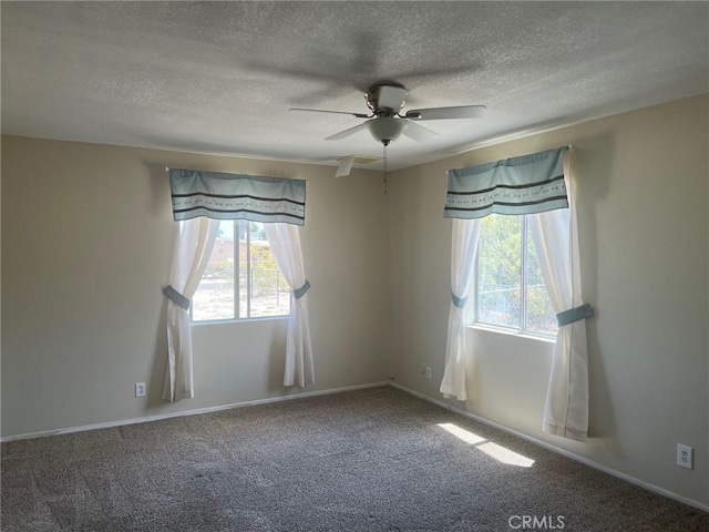 6614 Mojave Ave Unit 29, Palms, CA 92277 - carpeted spare room featuring a textured ceiling, healthy amount of natural light, and a ceiling fan