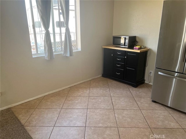 6614 Mojave Ave Unit 29, Palms, CA 92277 - dining room featuring light tile patterned flooring