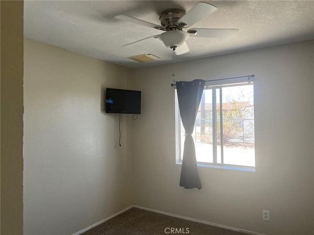 6614 Mojave Ave Unit 29, Palms, CA 92277 - unfurnished room featuring a textured ceiling, ceiling fan, and carpet floors