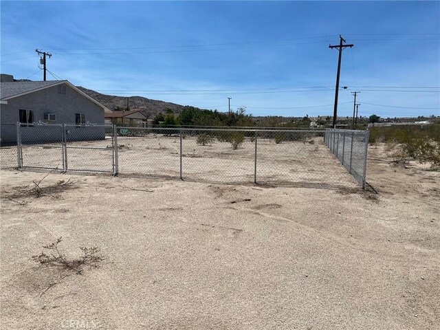 6614 Mojave Ave Unit 29, Palms, CA 92277 - view of yard with a gate
